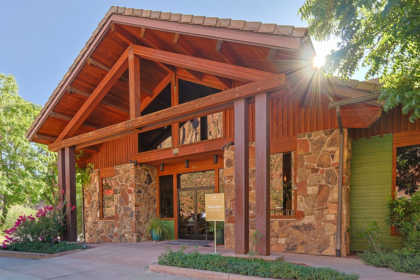 Lodge entrance with stone and timber architecture